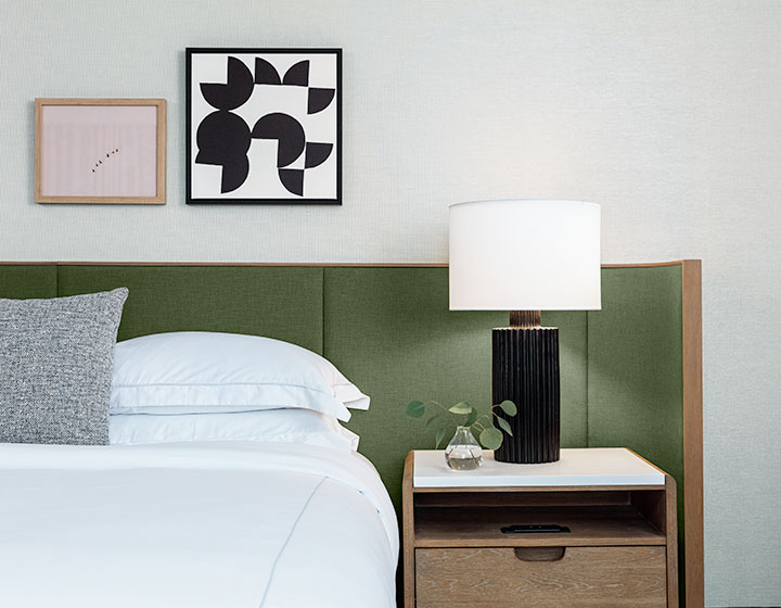 king guestroom with bedside table and lamp